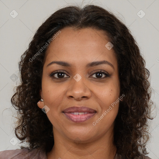 Joyful black young-adult female with medium  brown hair and brown eyes