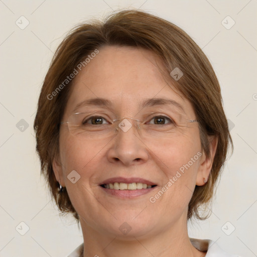 Joyful white adult female with medium  brown hair and grey eyes