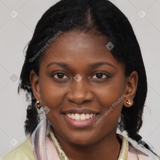 Joyful black young-adult female with medium  black hair and brown eyes