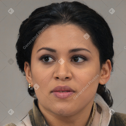 Joyful latino young-adult female with medium  brown hair and brown eyes