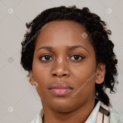 Neutral black young-adult female with short  brown hair and brown eyes