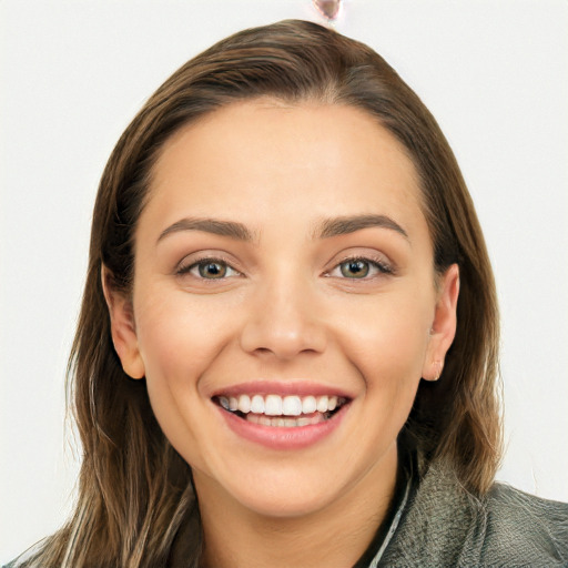 Joyful white young-adult female with long  brown hair and grey eyes