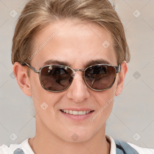 Joyful white young-adult female with short  brown hair and blue eyes