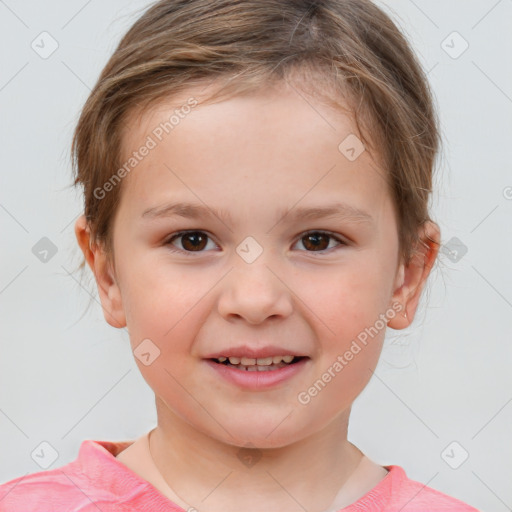 Joyful white child female with short  brown hair and brown eyes