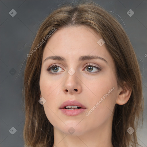 Neutral white young-adult female with long  brown hair and brown eyes