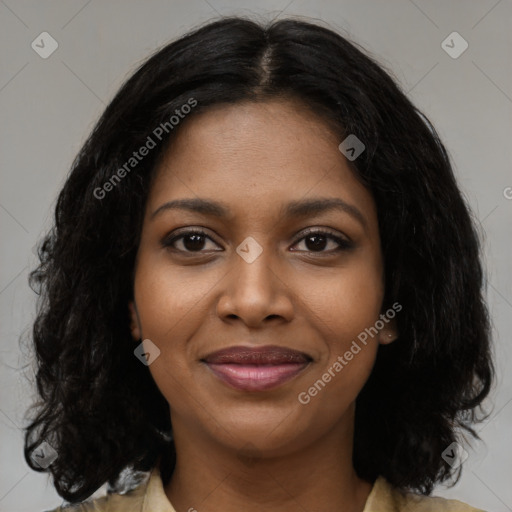 Joyful black young-adult female with medium  black hair and brown eyes