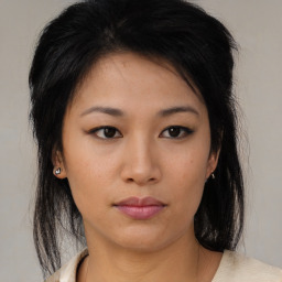 Neutral asian young-adult female with medium  brown hair and brown eyes