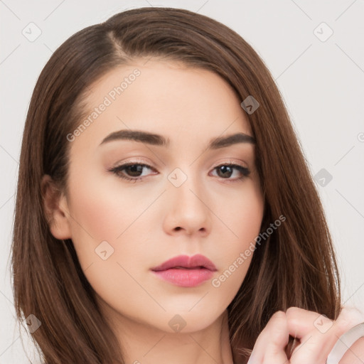 Neutral white young-adult female with long  brown hair and brown eyes