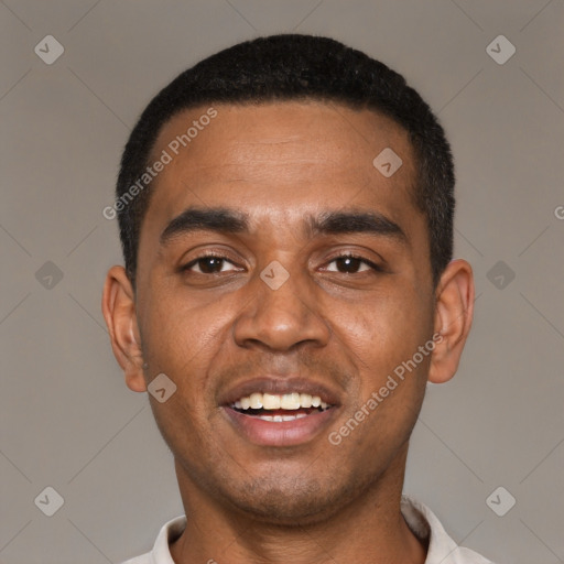 Joyful black young-adult male with short  black hair and brown eyes