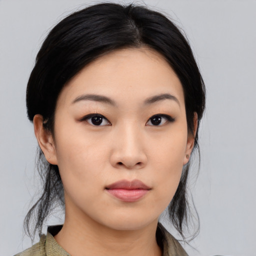 Neutral asian young-adult female with medium  black hair and brown eyes