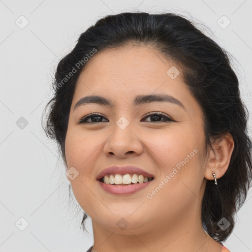 Joyful asian young-adult female with long  brown hair and brown eyes