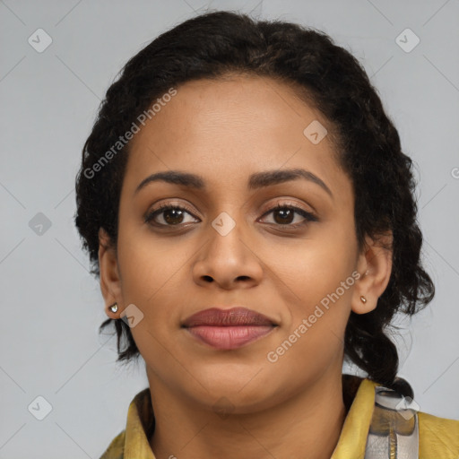 Joyful black young-adult female with medium  brown hair and brown eyes