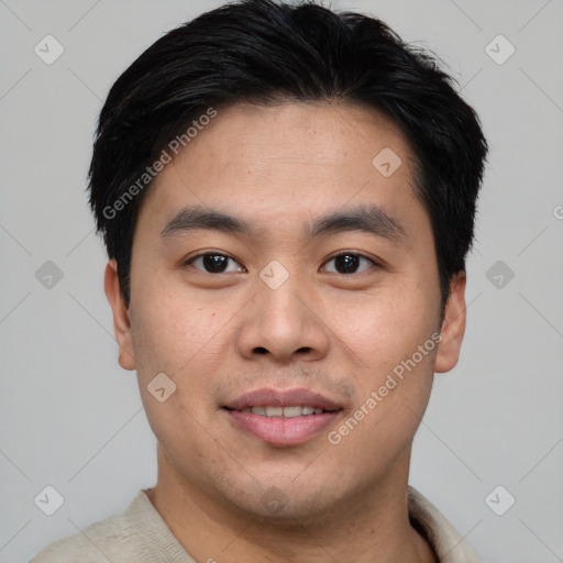 Joyful asian young-adult male with short  brown hair and brown eyes