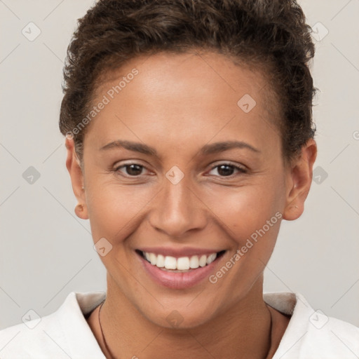 Joyful white young-adult female with short  brown hair and brown eyes