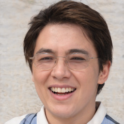 Joyful white adult male with medium  brown hair and brown eyes