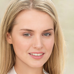 Joyful white young-adult female with long  brown hair and green eyes