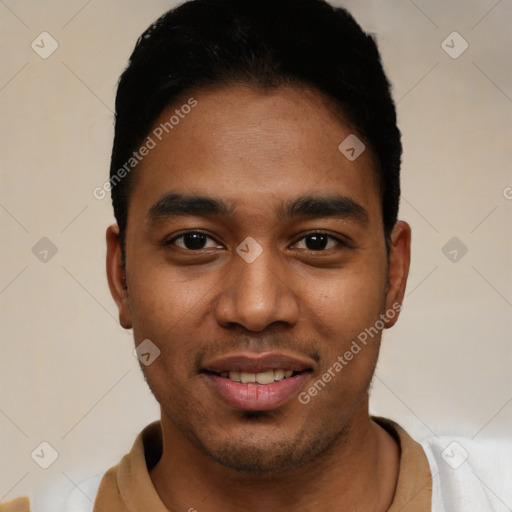 Joyful latino young-adult male with short  black hair and brown eyes