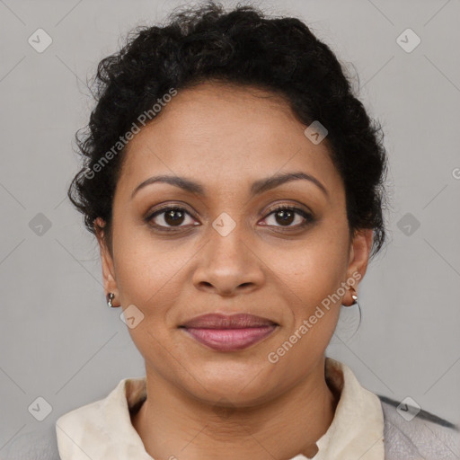 Joyful latino adult female with short  brown hair and brown eyes