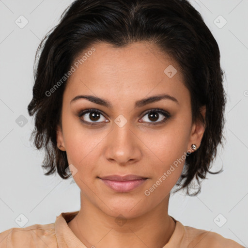 Joyful latino young-adult female with medium  brown hair and brown eyes