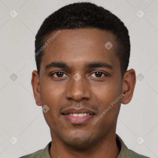 Joyful black young-adult male with short  brown hair and brown eyes