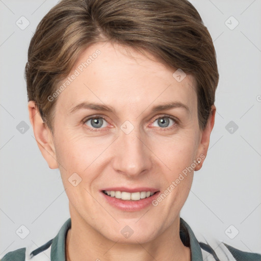 Joyful white young-adult female with short  brown hair and grey eyes