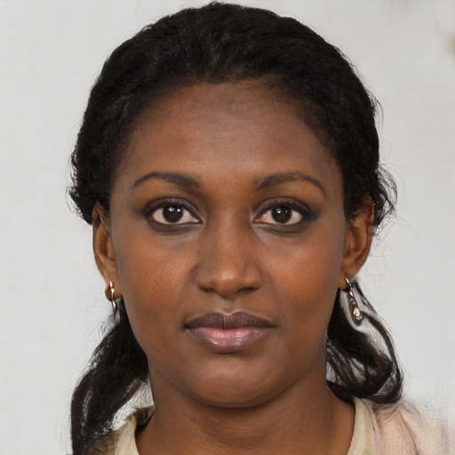 Neutral black young-adult female with long  black hair and brown eyes