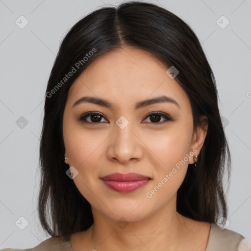 Joyful latino young-adult female with medium  brown hair and brown eyes