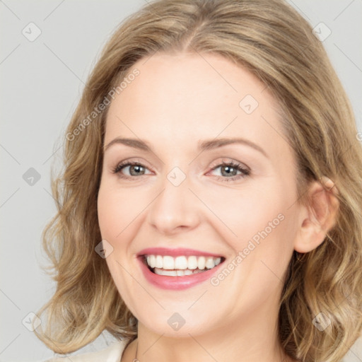 Joyful white young-adult female with medium  brown hair and green eyes