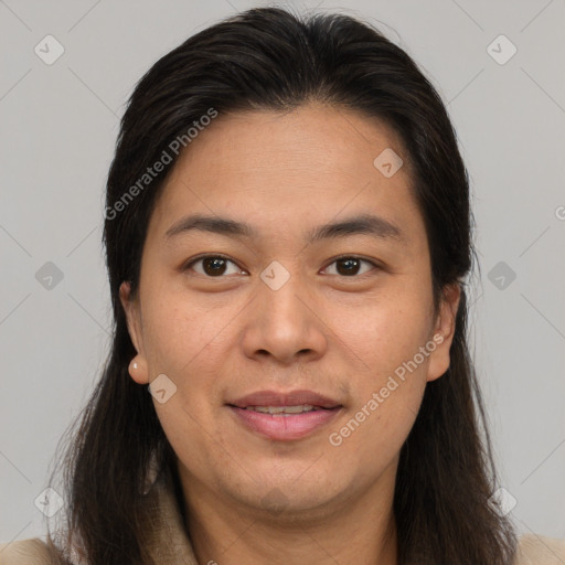 Joyful white young-adult female with long  brown hair and brown eyes