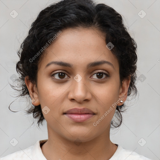 Joyful latino young-adult female with medium  brown hair and brown eyes