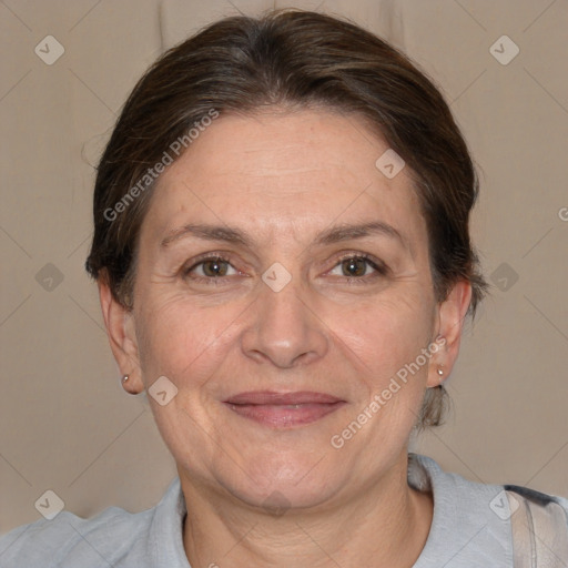 Joyful white adult female with short  brown hair and brown eyes