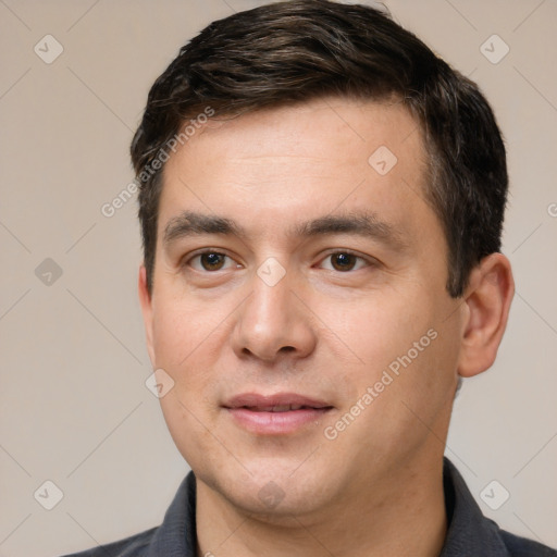 Joyful white young-adult male with short  brown hair and brown eyes