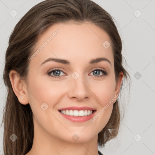 Joyful white young-adult female with medium  brown hair and green eyes