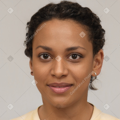 Joyful latino young-adult female with short  brown hair and brown eyes