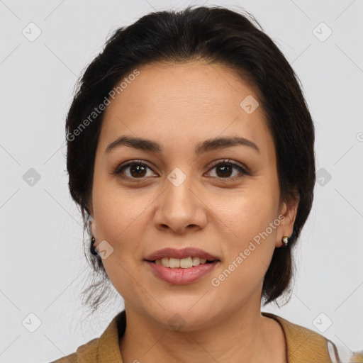 Joyful latino young-adult female with medium  brown hair and brown eyes