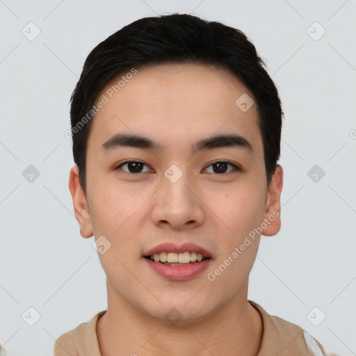 Joyful asian young-adult male with short  black hair and brown eyes