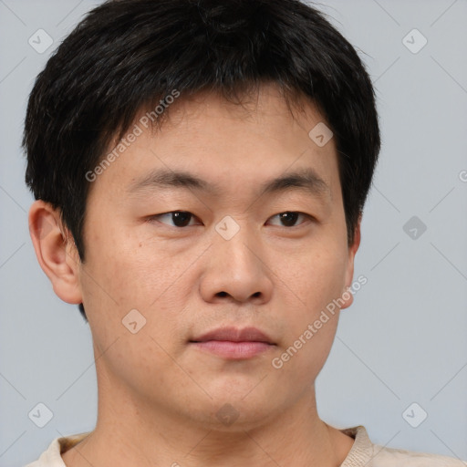 Neutral asian young-adult male with short  brown hair and brown eyes