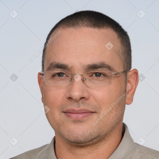 Joyful white adult male with short  black hair and brown eyes