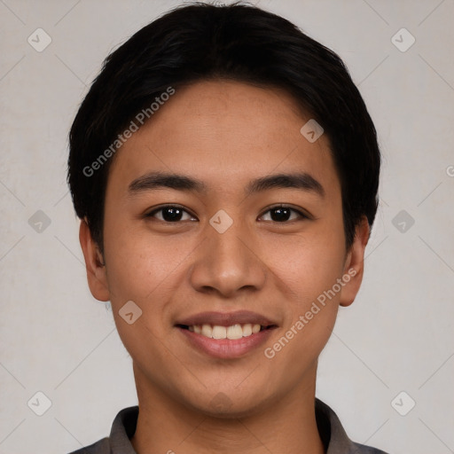 Joyful white young-adult male with short  black hair and brown eyes