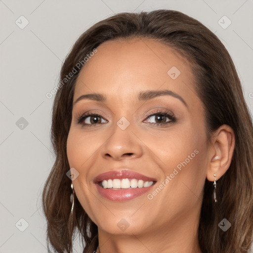 Joyful white young-adult female with long  brown hair and brown eyes