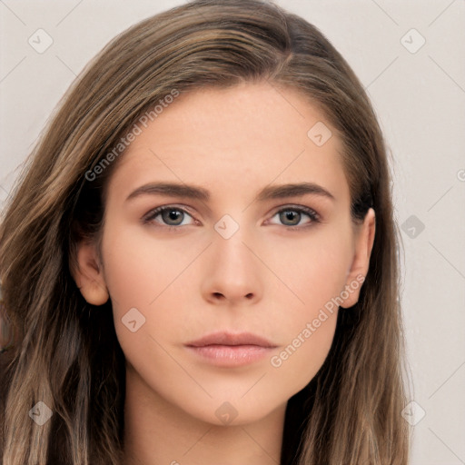 Neutral white young-adult female with long  brown hair and brown eyes