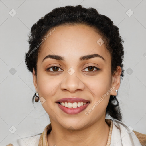 Joyful latino young-adult female with long  black hair and brown eyes