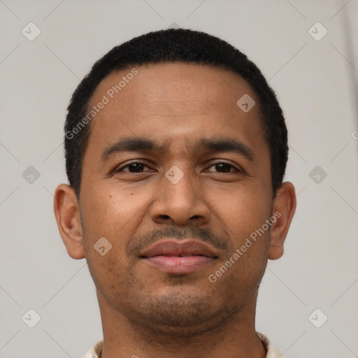 Neutral latino young-adult male with short  black hair and brown eyes