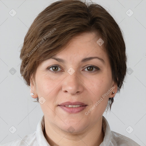 Joyful white adult female with short  brown hair and brown eyes