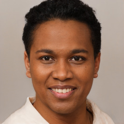 Joyful black young-adult male with short  brown hair and brown eyes