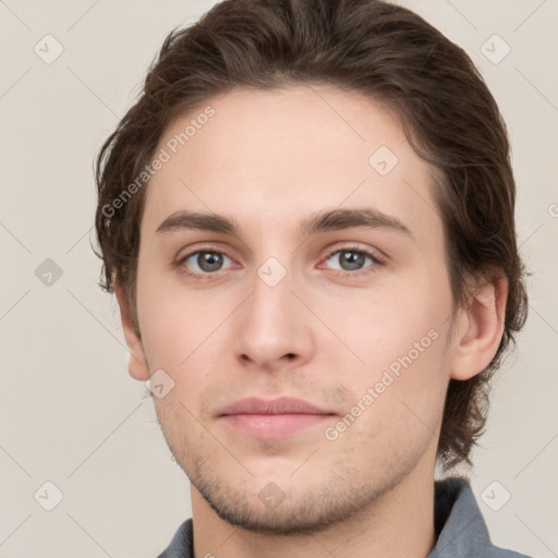 Neutral white young-adult male with short  brown hair and grey eyes