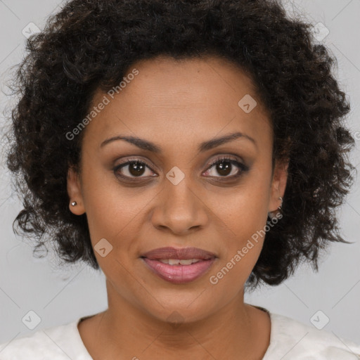 Joyful black young-adult female with medium  brown hair and brown eyes