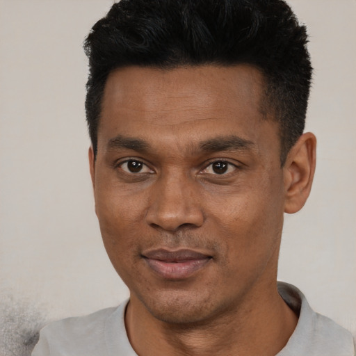 Neutral black young-adult male with short  black hair and brown eyes