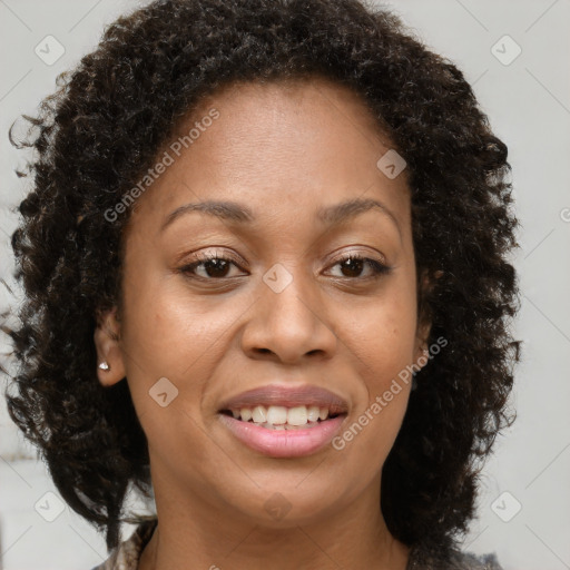 Joyful black young-adult female with medium  brown hair and brown eyes