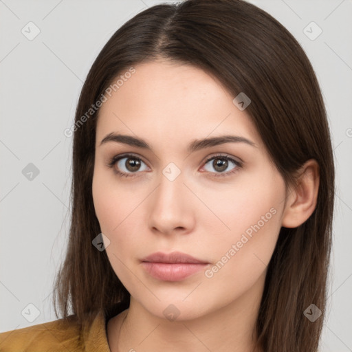 Neutral white young-adult female with long  brown hair and brown eyes